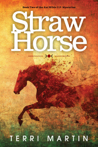 Book cover for "Straw Horse" by Terri Martin. Features a silhouette of a running horse against a textured background with a large sun. Subtitle reads "Book Two of the Kat Wilde U.P. Mysteries.